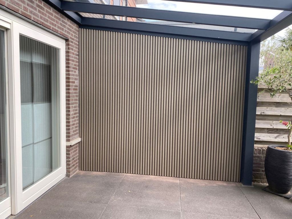Veranda mit WPC-Fassadenverkleidung in Sittard-Geleen und Limburg.