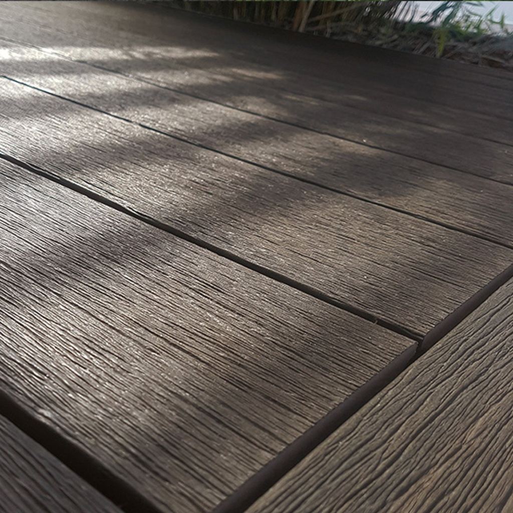 High-quality composite decking with a natural wood look and texture, perfect for garden and patio.