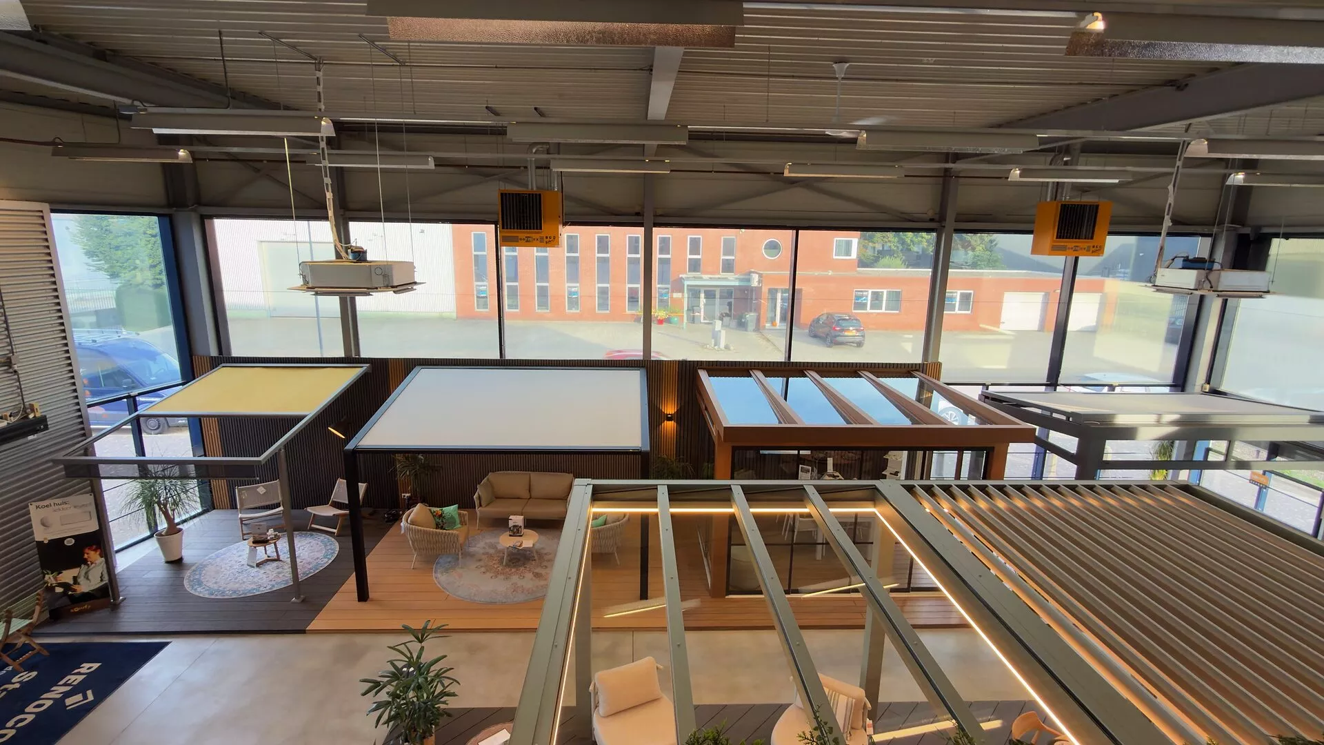 Louvred roofs and patio covers seen from above in the Renoco showroom in Sittard