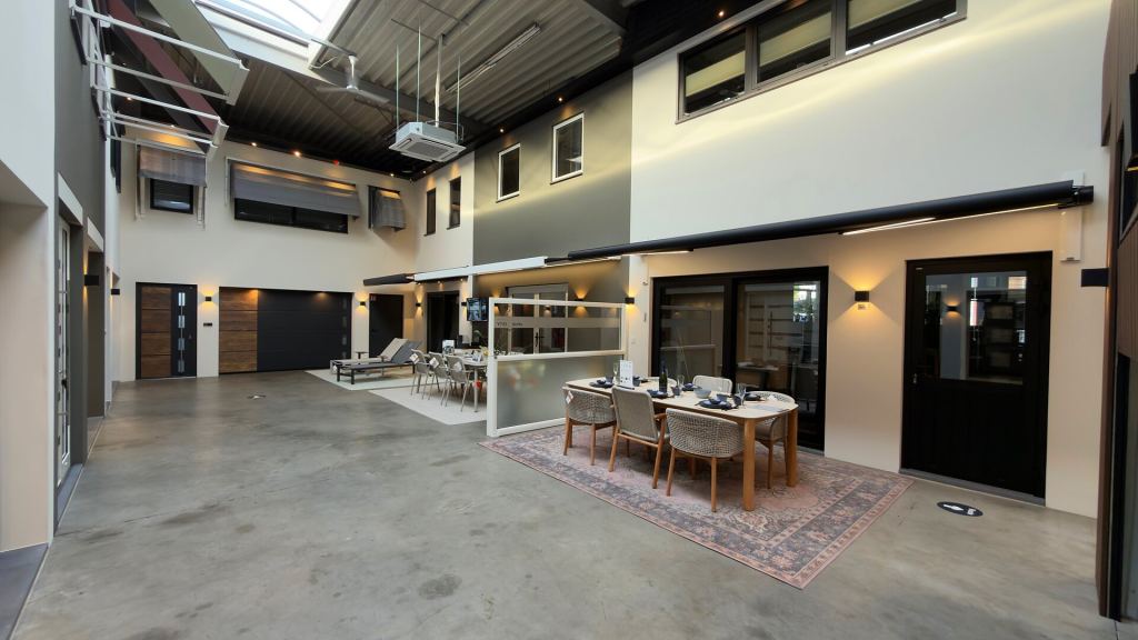 Front doors, garage doors, awnings and a garden furniture set in the Renoco showroom in Sittard.